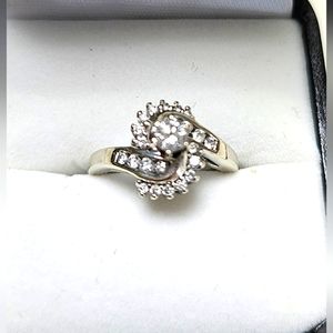 White gold engagement ring 14kt and diamonds.